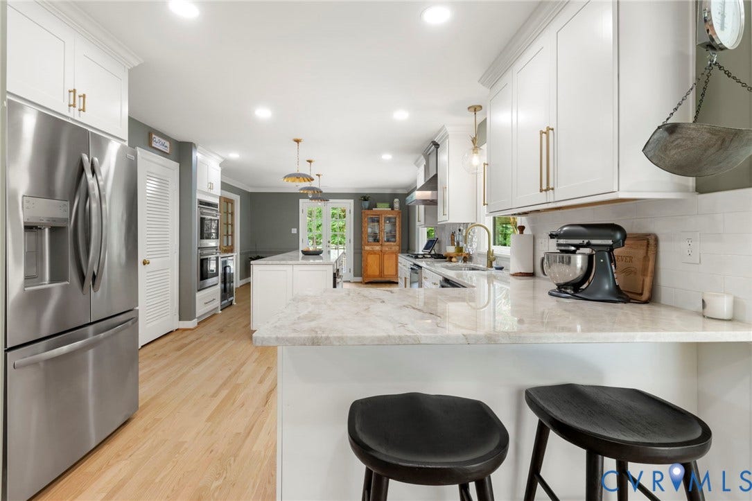 13531 W Salisbury Road, Salisbury, Midlothian, VA 23113 Kitchen featuring stainless steel appliances, light wood-finish flooring, white cabinetry with gold-tone hardware, and light-toned countertops