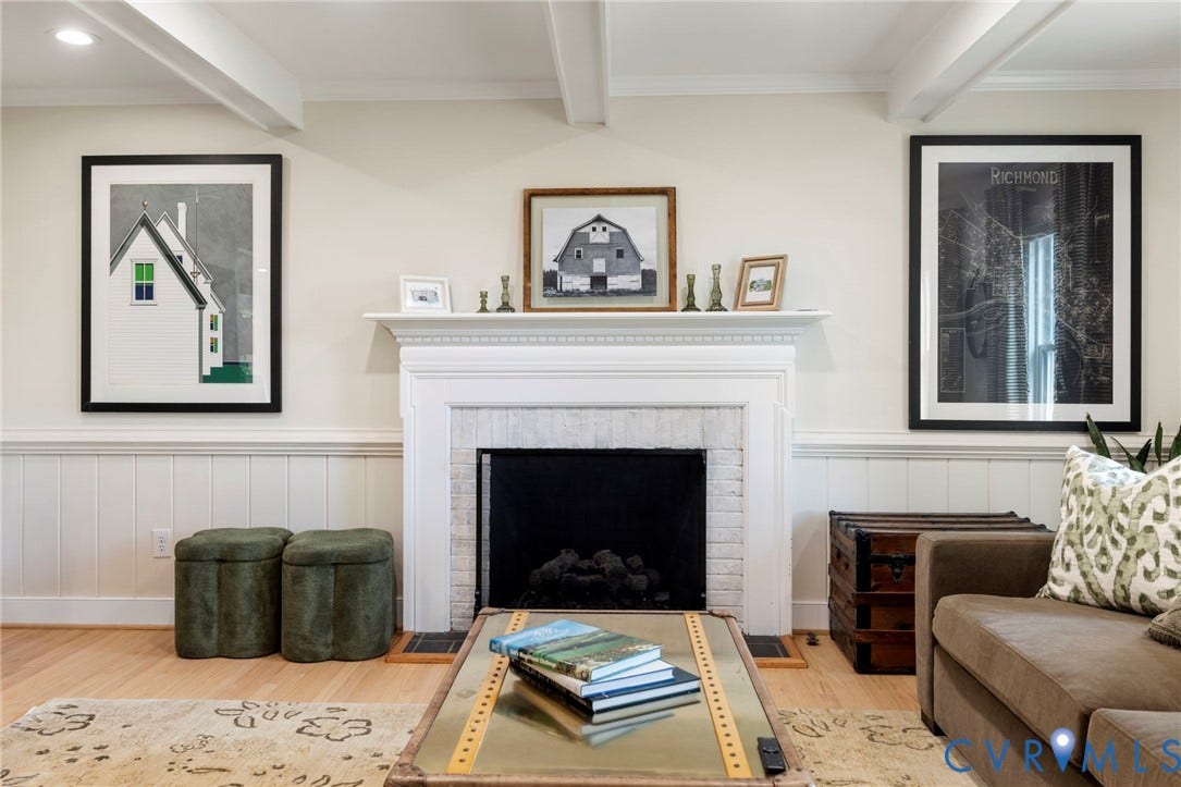 13531 W Salisbury Road, Salisbury, Midlothian, VA 23113 White exposed ceiling beams, white wainscoting, light wood-finish flooring, and a fireplace featuring a white mantel and light-colored brick surround