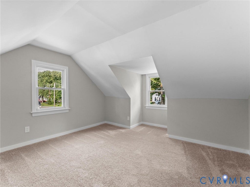 4818 Castlewood Road, Richmond, VA 23234 Sloped ceilings, neutral carpet flooring, and dual windows