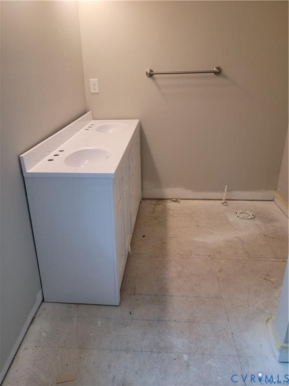 Lot 313 Shenandoah Crossing Drive, Gordonsville, VA 22942 White double vanity with integrated sinks, white countertop, and brushed metal towel bar