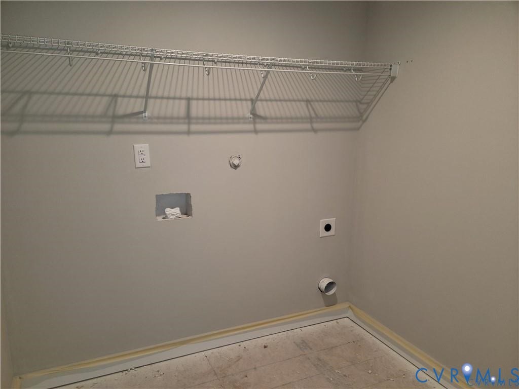 Lot 313 Shenandoah Crossing Drive, Gordonsville, VA 22942 Laundry area featuring a wire shelf, wall-mounted electrical outlets, and plumbing connections