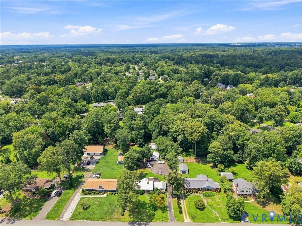 1904 Fon Du Lac Road, Henrico, VA 23229 Aerial perspective showcasing expansive tree canopy coverage