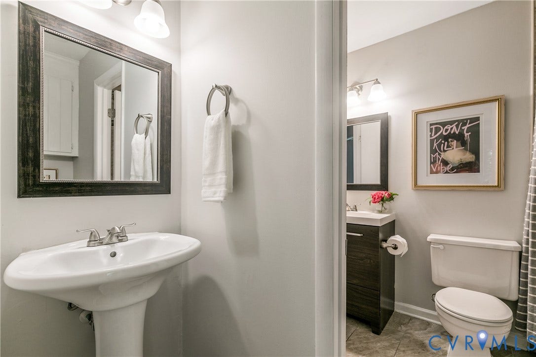928 Marblethorpe Road, North Chesterfield, VA 23236 Half bath is attached to the primary bedroom as well as the full bathroom.