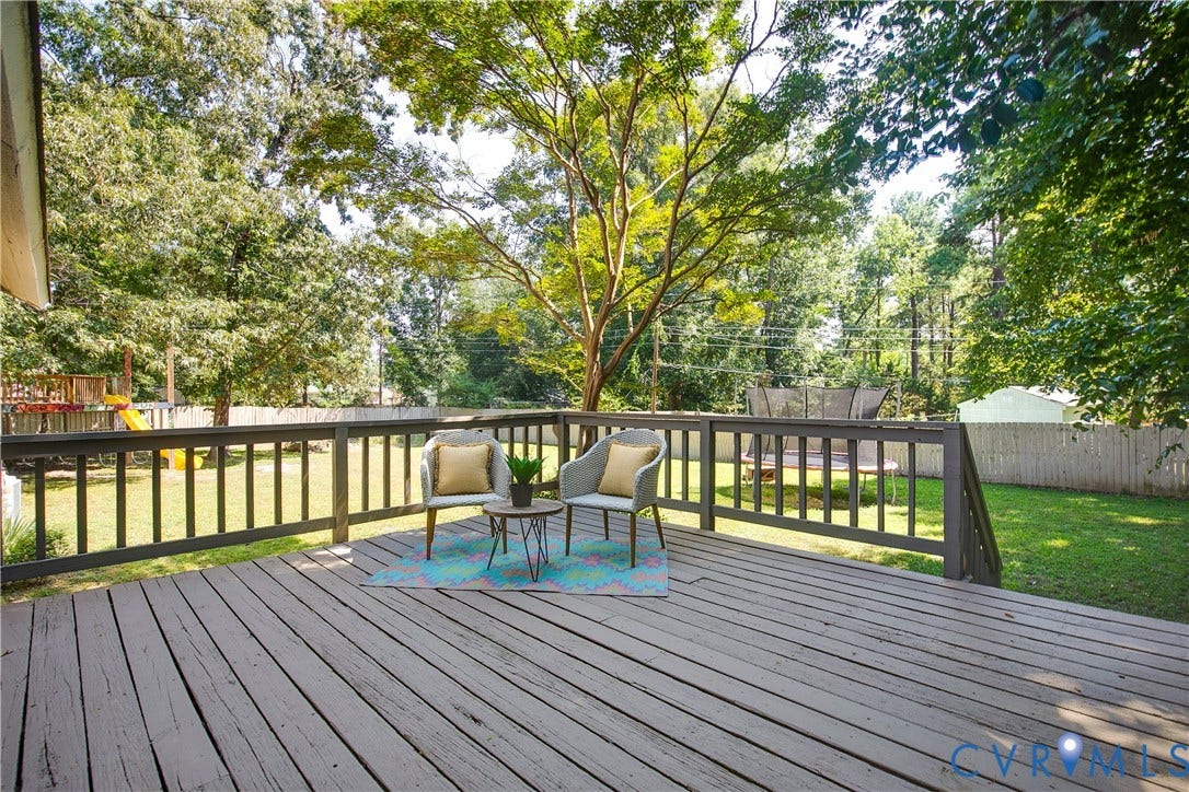 928 Marblethorpe Road, North Chesterfield, VA 23236 Enjoy fall nights on the large back deck perfect for unwinding, grilling or entertaining.