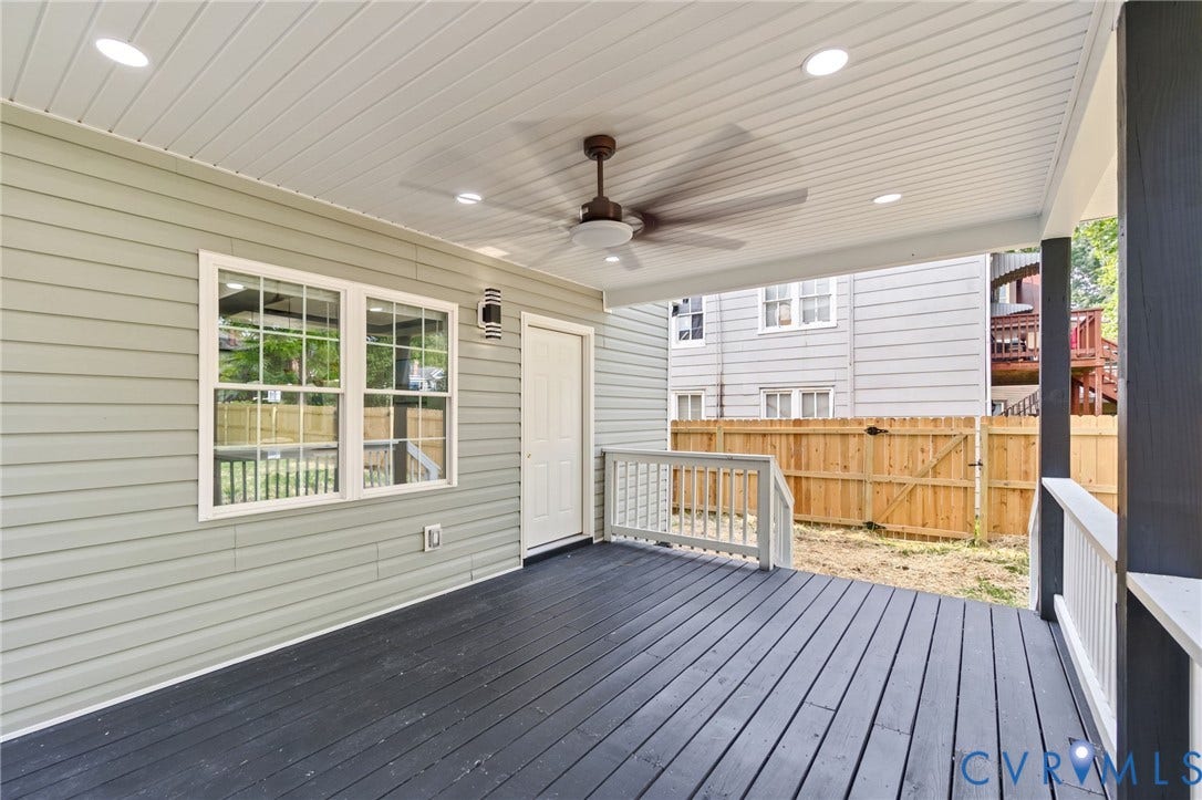 409 S Jefferson Street, Bolling, Petersburg, VA 23803 Spacious covered porch featuring composite decking, recessed ceiling lighting, and ceiling fan