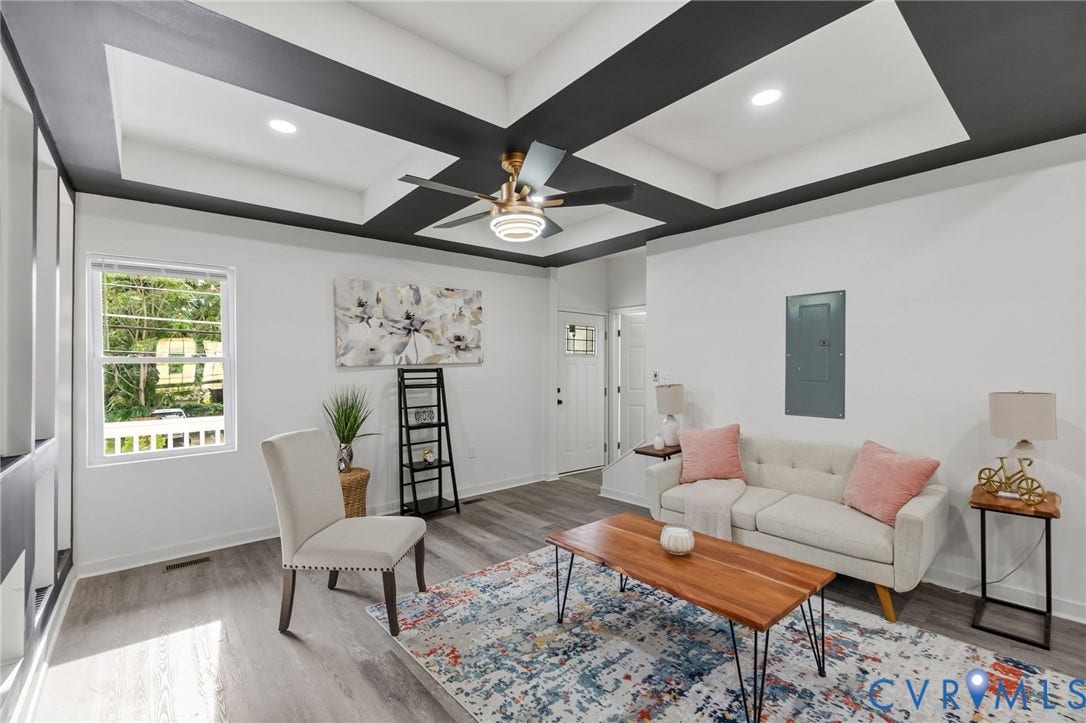 409 S Jefferson Street, Bolling, Petersburg, VA 23803 Tray ceiling with decorative dark accents, recessed lighting, and a ceiling fan