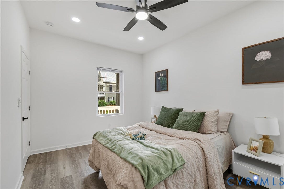 409 S Jefferson Street, Bolling, Petersburg, VA 23803 Recessed lighting, ceiling fan, wood-finish flooring, white walls, and a window with blinds