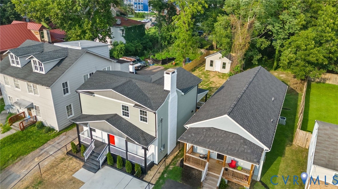 409 S Jefferson Street, Bolling, Petersburg, VA 23803 Contemporary home featuring a modern architectural design with clean lines, multi-level construction, and a striking dark-roof profile