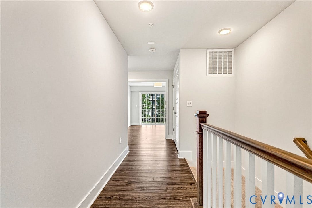 4347 Saunders Station Loop, #A, Glen Allen, VA 23233 Bright hallway with wood-finish flooring, white painted walls, and recessed lighting