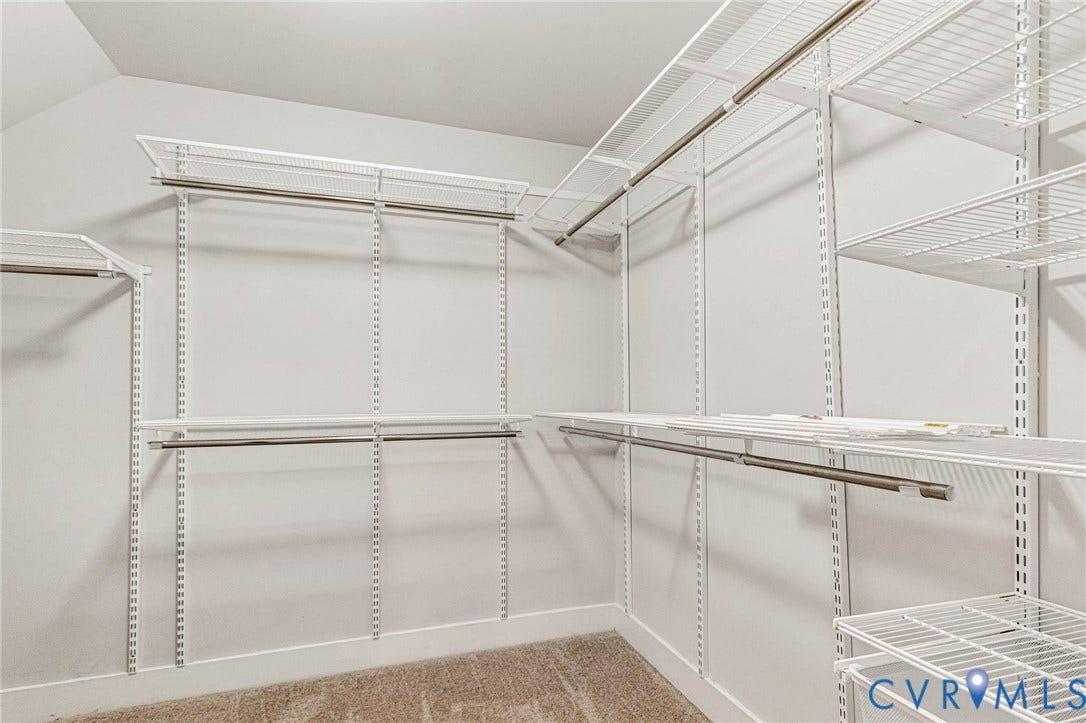4347 Saunders Station Loop, #A, Glen Allen, VA 23233 Customizable wire shelving system with multiple hanging rods and white walls