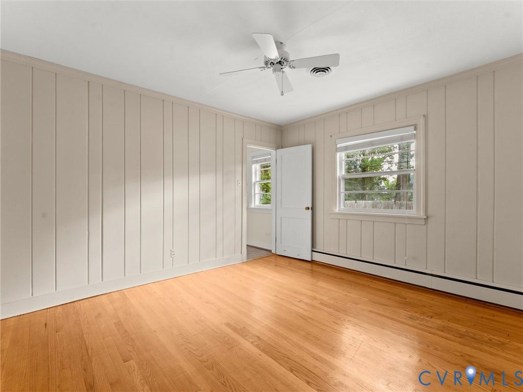 4608 Grove Avenue, Mary Munford, Richmond, VA 23226 Bedroom #3 with paneled walls, closet, and wood floors.