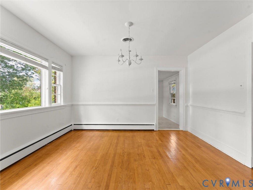 4608 Grove Avenue, Mary Munford, Richmond, VA 23226 Dining room has picture window, chair rail and hardwood floors.