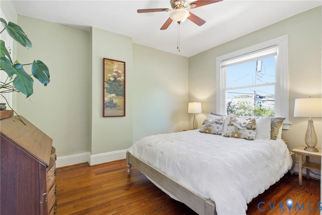 212 S Belmont Avenue, Carytown, Richmond, VA 23221 Wood-finish flooring, ceiling fan, and window with white trim