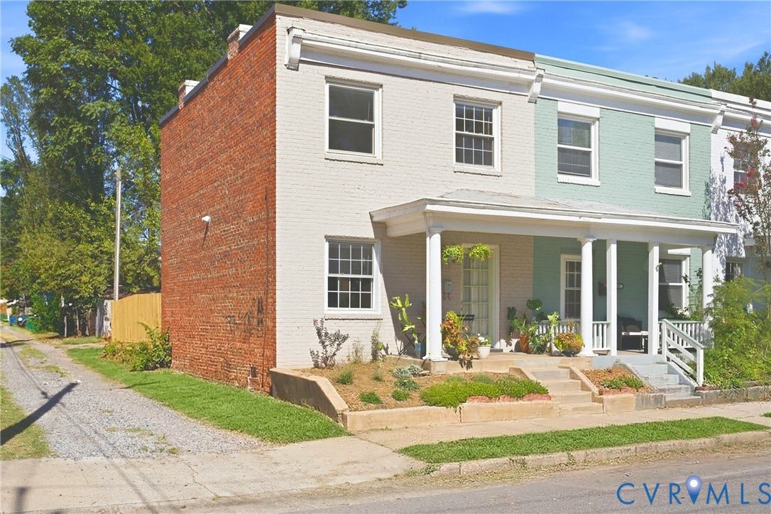 212 S Belmont Avenue, Carytown, Richmond, VA 23221 Painted brick facade with white trim, columned front porch, and concrete front steps