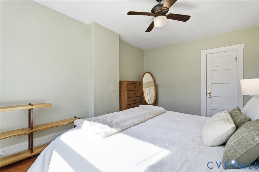 212 S Belmont Avenue, Carytown, Richmond, VA 23221 Ceiling fan with integrated lighting, paneled door with trim, and light-toned wall paint