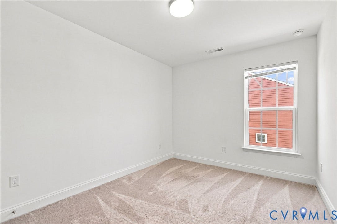 13820 Village View Drive, Midlothian, VA 23114 Neutral wall color, light-toned carpet, single window with blinds, ceiling-mounted light fixture, white trim