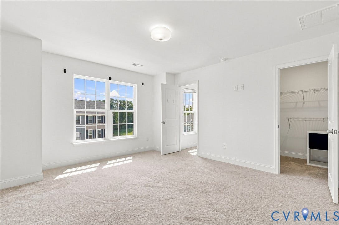13820 Village View Drive, Midlothian, VA 23114 Bright interior with neutral carpeting, large double window, and a built-in closet system