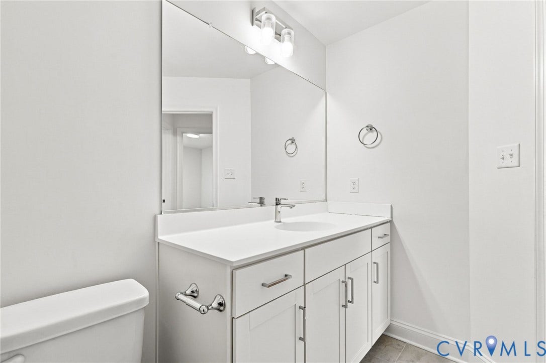 13820 Village View Drive, Midlothian, VA 23114 White vanity with undermount sink, contemporary faucet, and integrated countertop