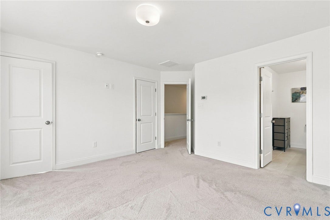13820 Village View Drive, Midlothian, VA 23114 Neutral color palette with light-toned carpeting and flush-mount ceiling light