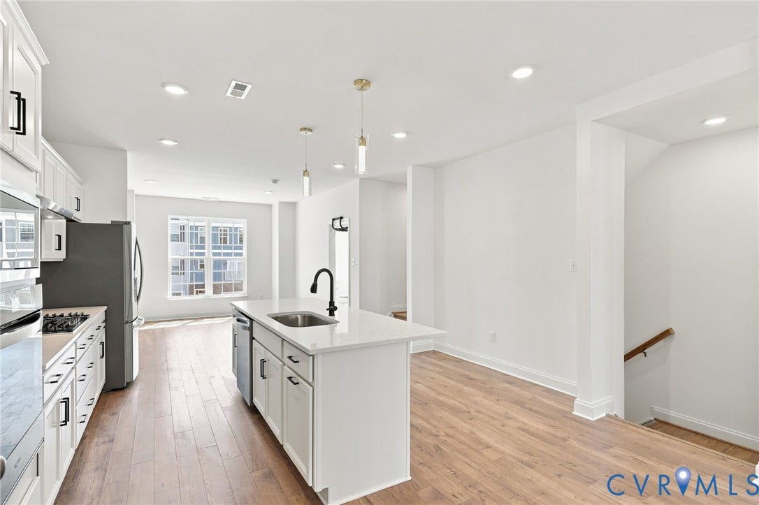 13820 Village View Drive, Midlothian, VA 23114 Open-concept living area featuring wood-finish flooring and recessed lighting
