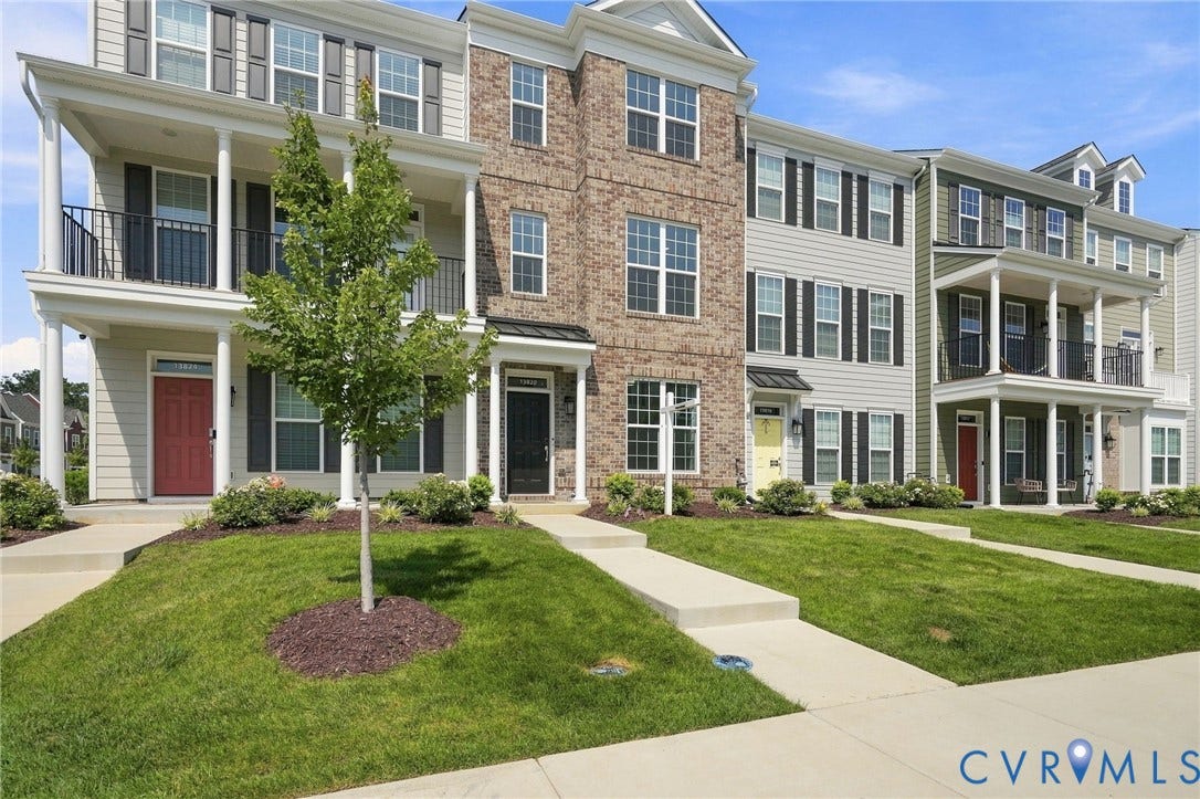 13820 Village View Drive, Midlothian, VA 23114 Multiple townhomes featuring varied exterior finishes including brick and siding