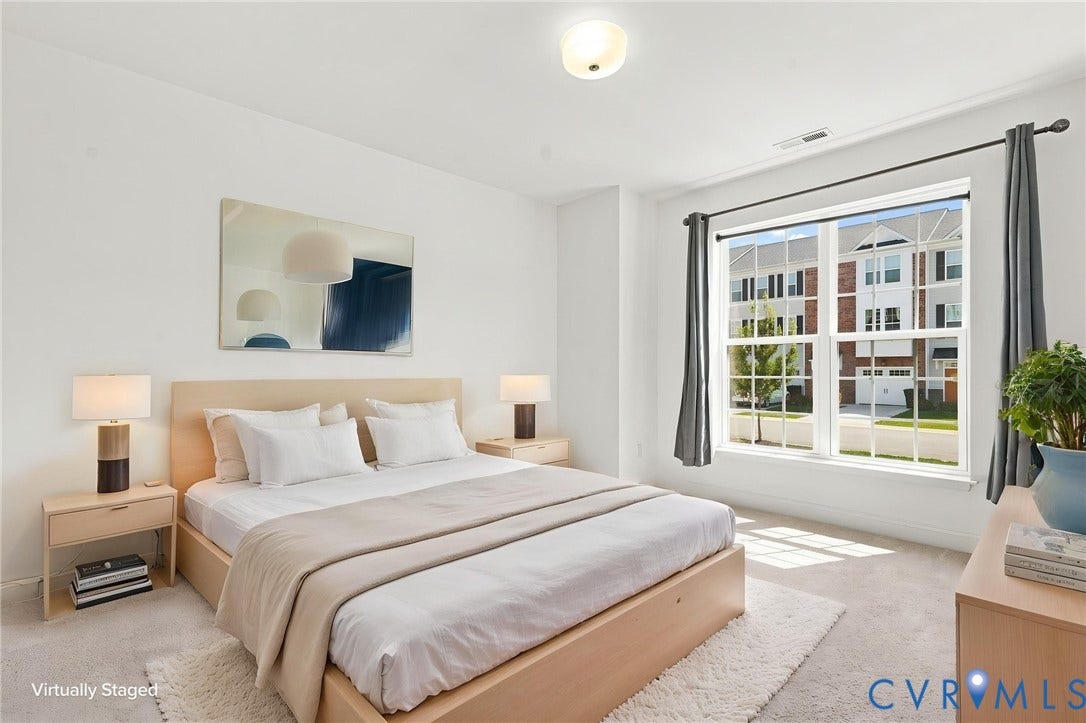 13820 Village View Drive, Midlothian, VA 23114 White walls, recessed lighting, and a large window with white trim