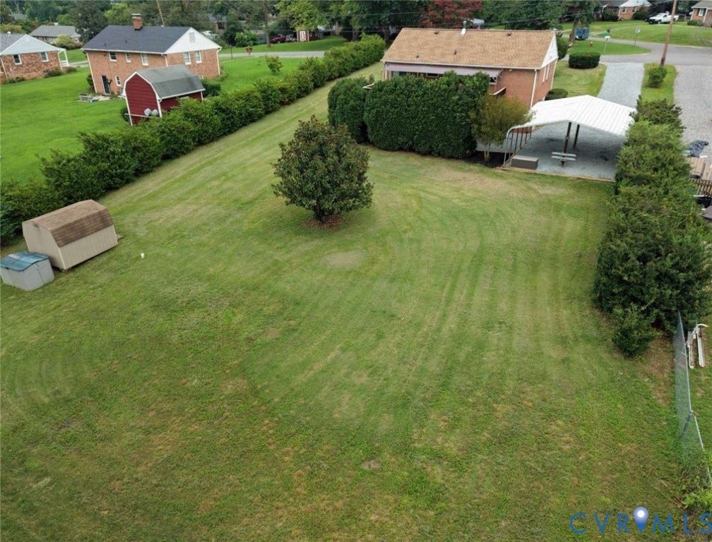 12853 Holly Lane, Manakin Sabot, VA 23103 Expansive lawn featuring mature trees and a detached shed