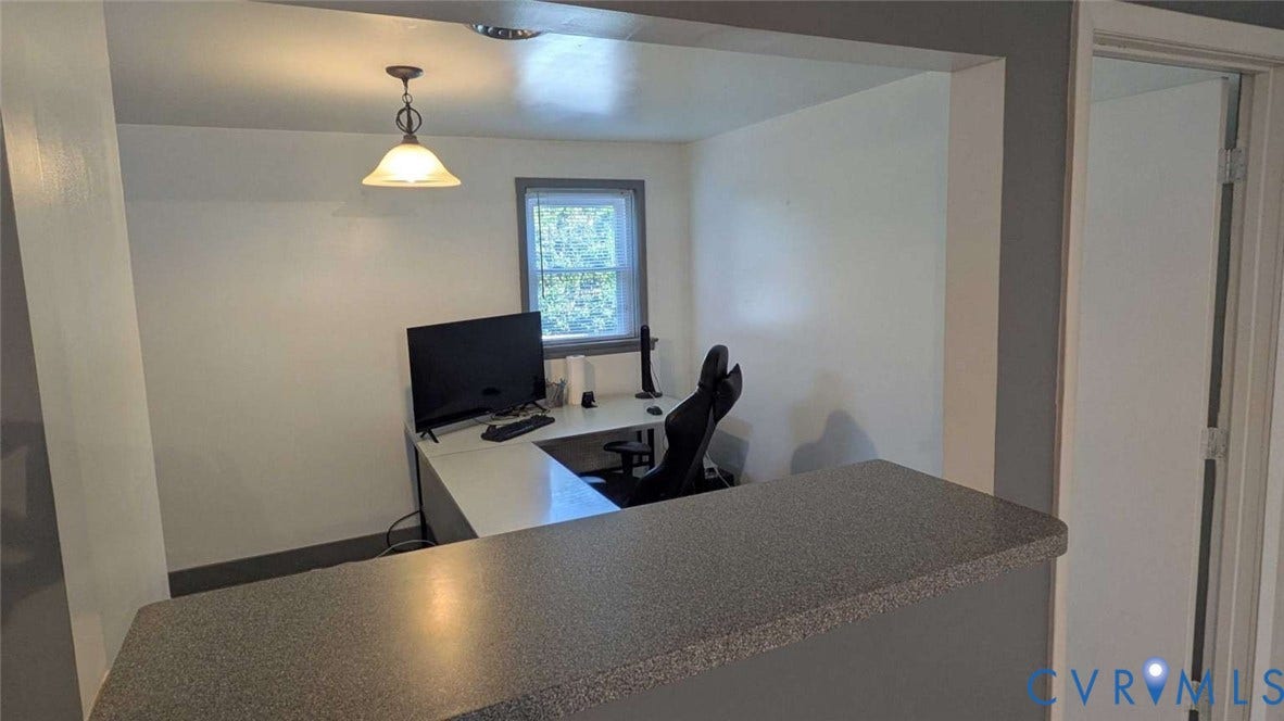 12853 Holly Lane, Manakin Sabot, VA 23103 Recessed area with a window, overhead pendant light, and a built-in counter