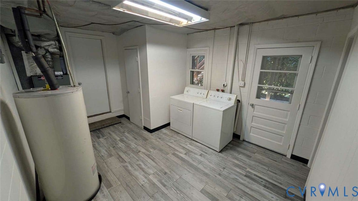 12853 Holly Lane, Manakin Sabot, VA 23103 Wood-finish flooring with white painted walls and a window