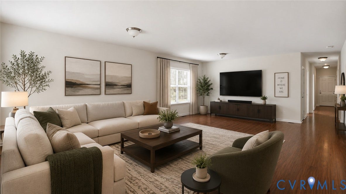 Spacious living area featuring light-toned walls, recessed lighting, wood-finish flooring, virtually staged