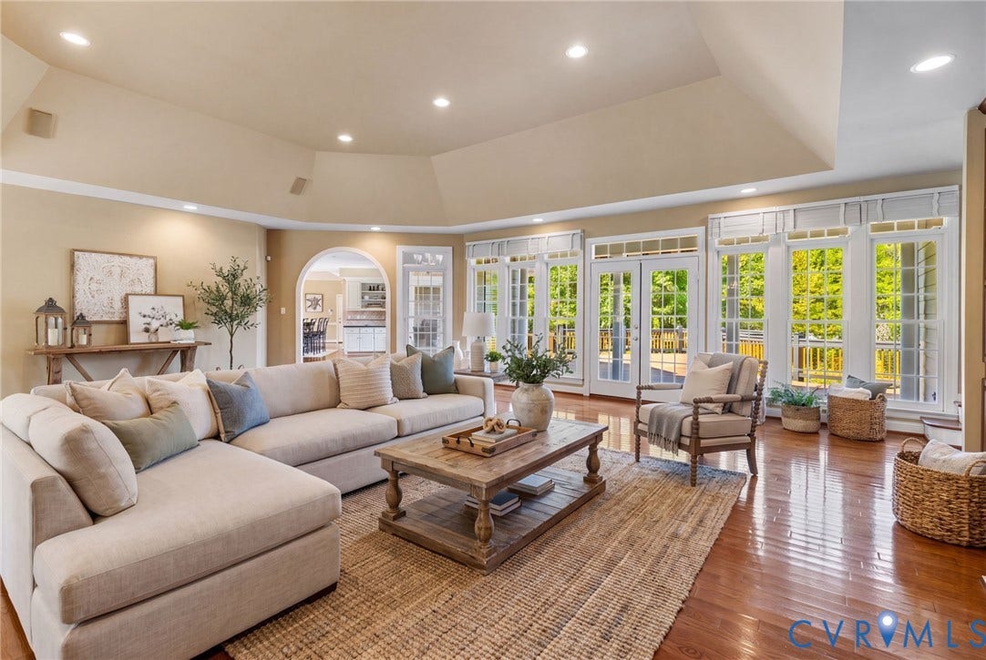 2365 Manakintown Ferry Road, Powhatan, VA 23113 Hardwood flooring, recessed lighting, arched doorway, and abundant natural light from multiple glass-paneled doors and windows