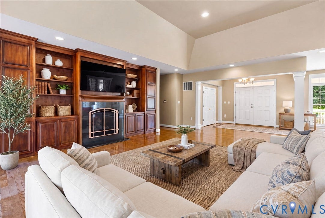 2365 Manakintown Ferry Road, Powhatan, VA 23113 Built-in custom cabinetry with shelving, recessed lighting, wood-finish flooring, fireplace with hearth, and double entry doors