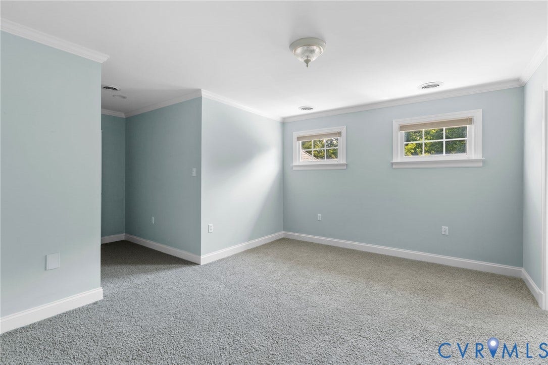 2365 Manakintown Ferry Road, Powhatan, VA 23113 Room featuring light blue walls, white trim, and gray carpet