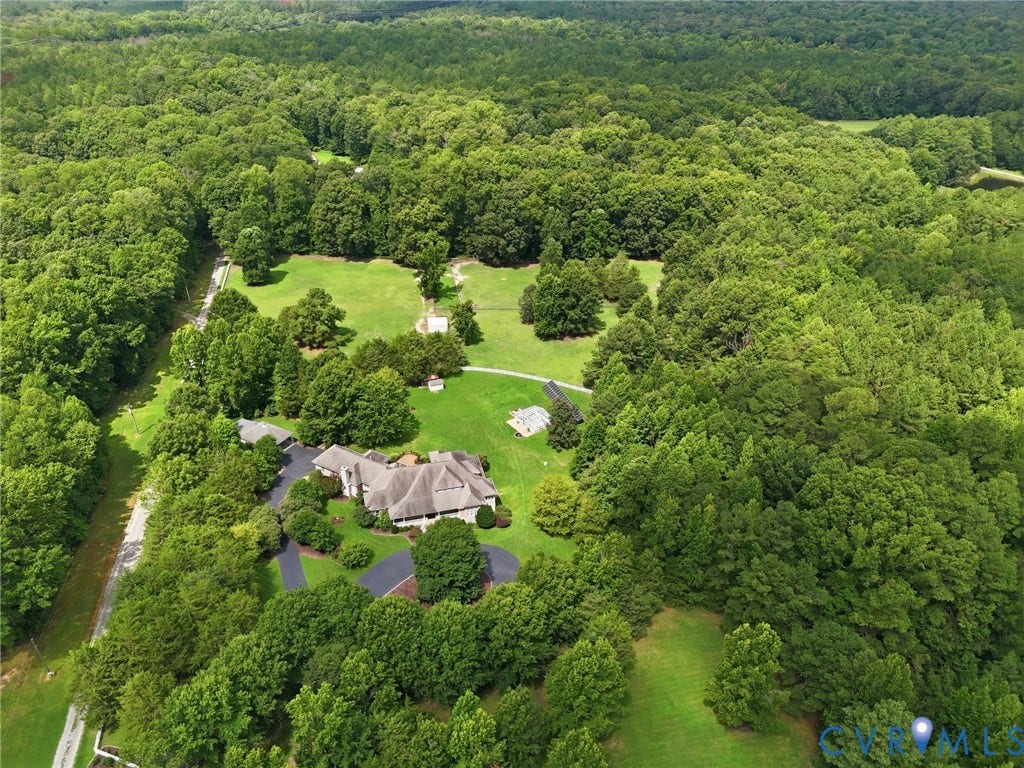 2365 Manakintown Ferry Road, Powhatan, VA 23113 Sprawling estate nestled on lush, manicured grounds surrounded by mature tree lines