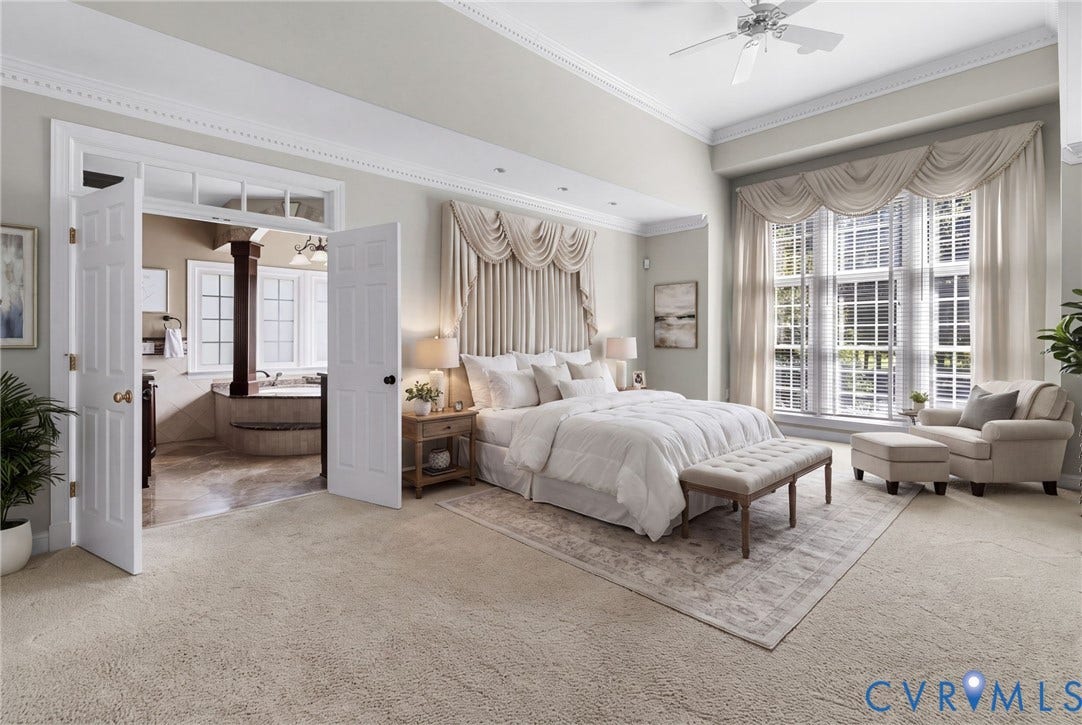 2365 Manakintown Ferry Road, Powhatan, VA 23113 Tray ceiling with crown molding, ceiling fan, and large windows with plantation shutters