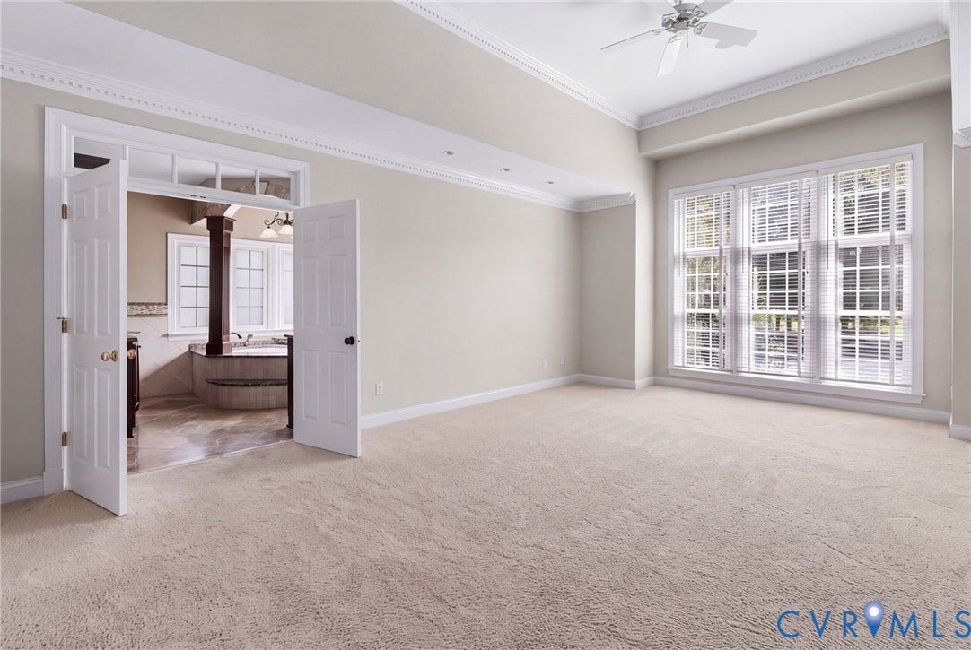 2365 Manakintown Ferry Road, Powhatan, VA 23113 Expansive room featuring light-toned carpet flooring and a multi-pane window array