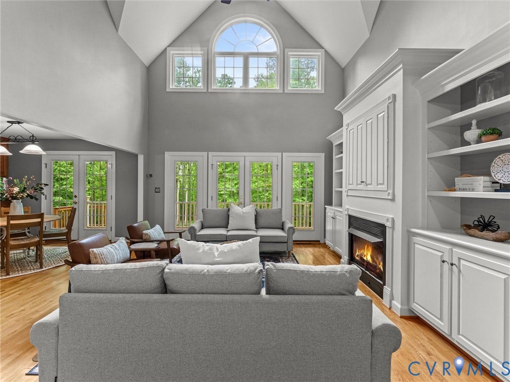 Vaulted ceiling with arched and rectangular windows