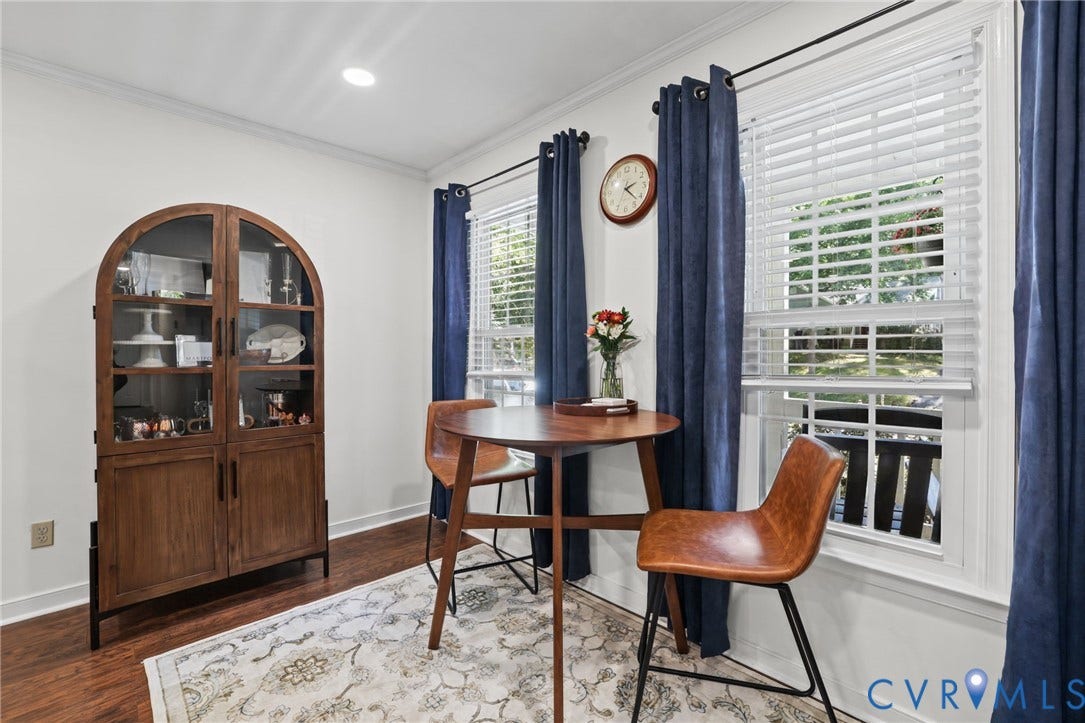 13512 Master Stag Drive, Midlothian, VA 23112 Arched wood display cabinet, wood-finish flooring, and double-hung windows with horizontal blinds