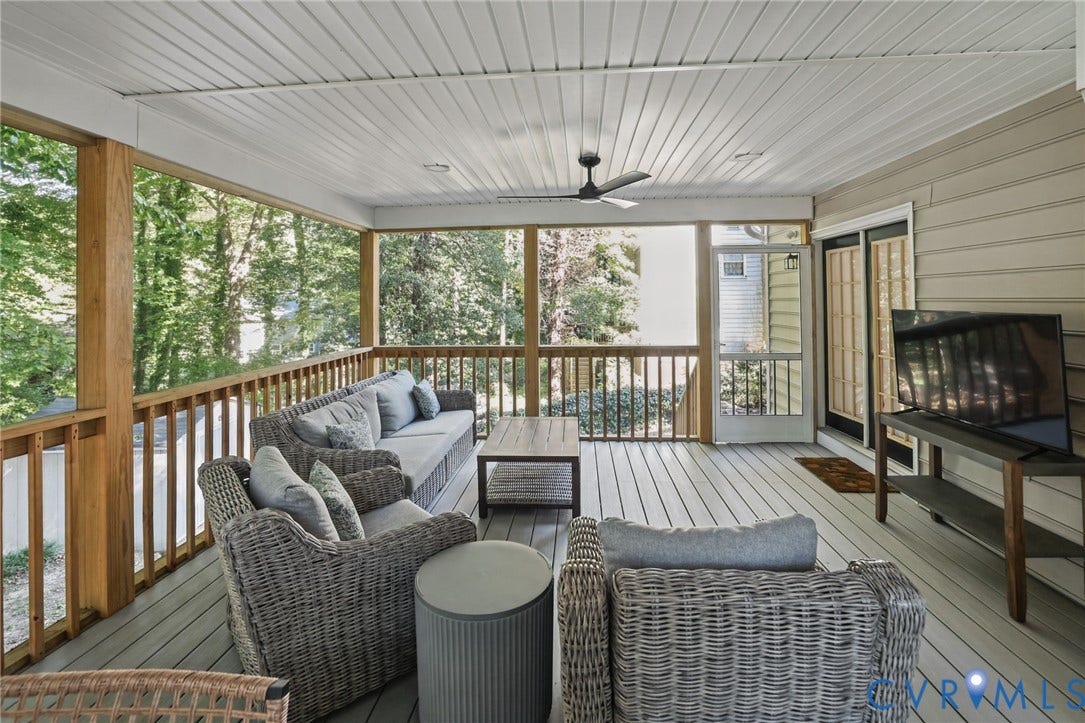 13512 Master Stag Drive, Midlothian, VA 23112 Screened-in porch featuring painted wood decking, a beadboard ceiling, a ceiling-mounted fan, and natural wood railings