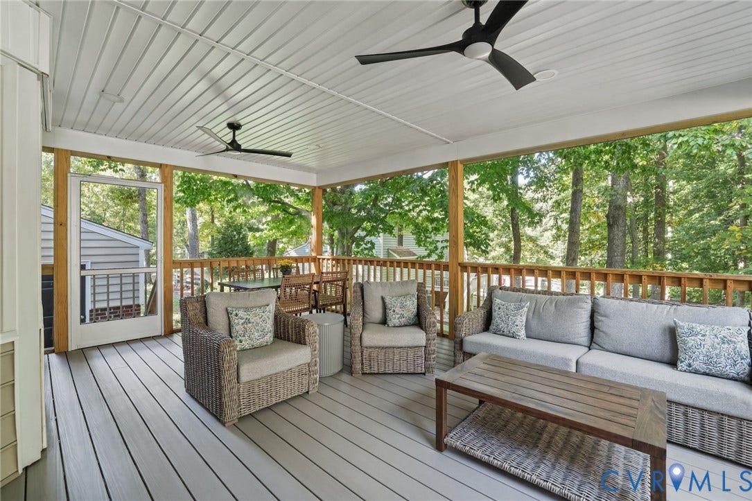 13512 Master Stag Drive, Midlothian, VA 23112 Covered porch featuring wood-finish decking, tongue-and-groove ceiling, dual ceiling fans, and a wood railing