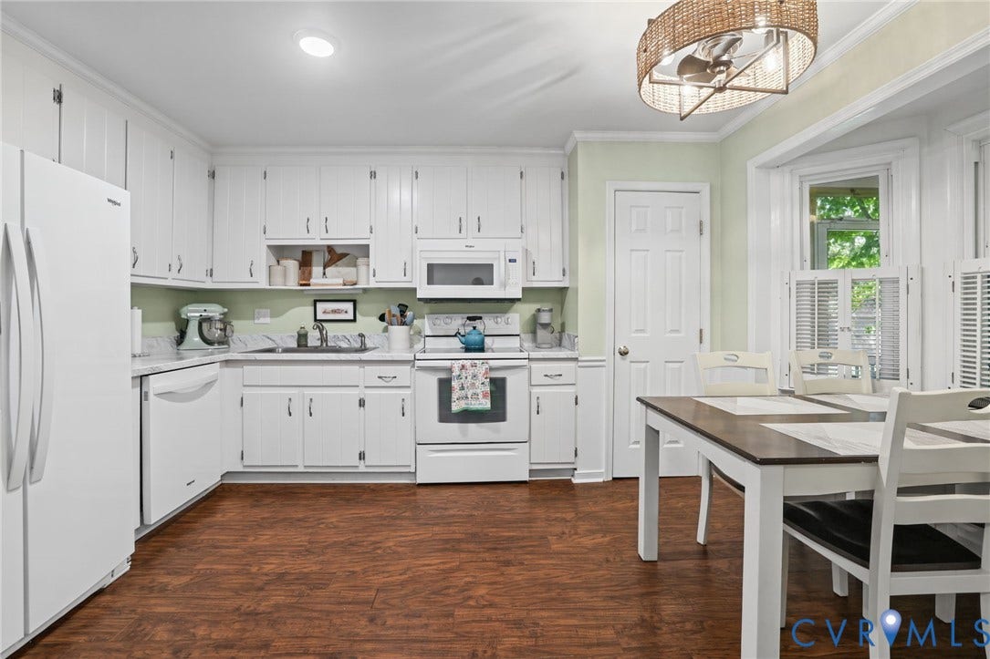 13512 Master Stag Drive, Midlothian, VA 23112 Kitchen featuring white cabinetry, wood-finish flooring, stone-patterned laminate countertops, a built-in microwave, and a drum-style pendant light fixture