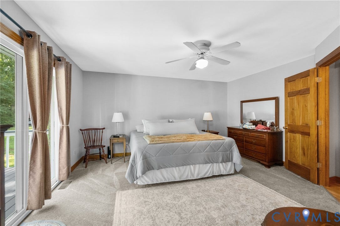 3621 Jefferson Highway, Rual, Mineral, VA 23093 Recessed lighting, ceiling fan, sliding glass door, light-toned carpeting, and wood panel door