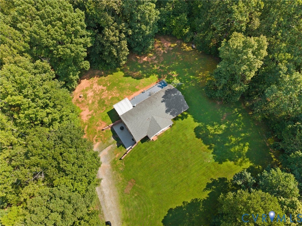 3621 Jefferson Highway, Rual, Mineral, VA 23093 Expansive property with a gabled roofline, substantial tree coverage, and a large lawn area