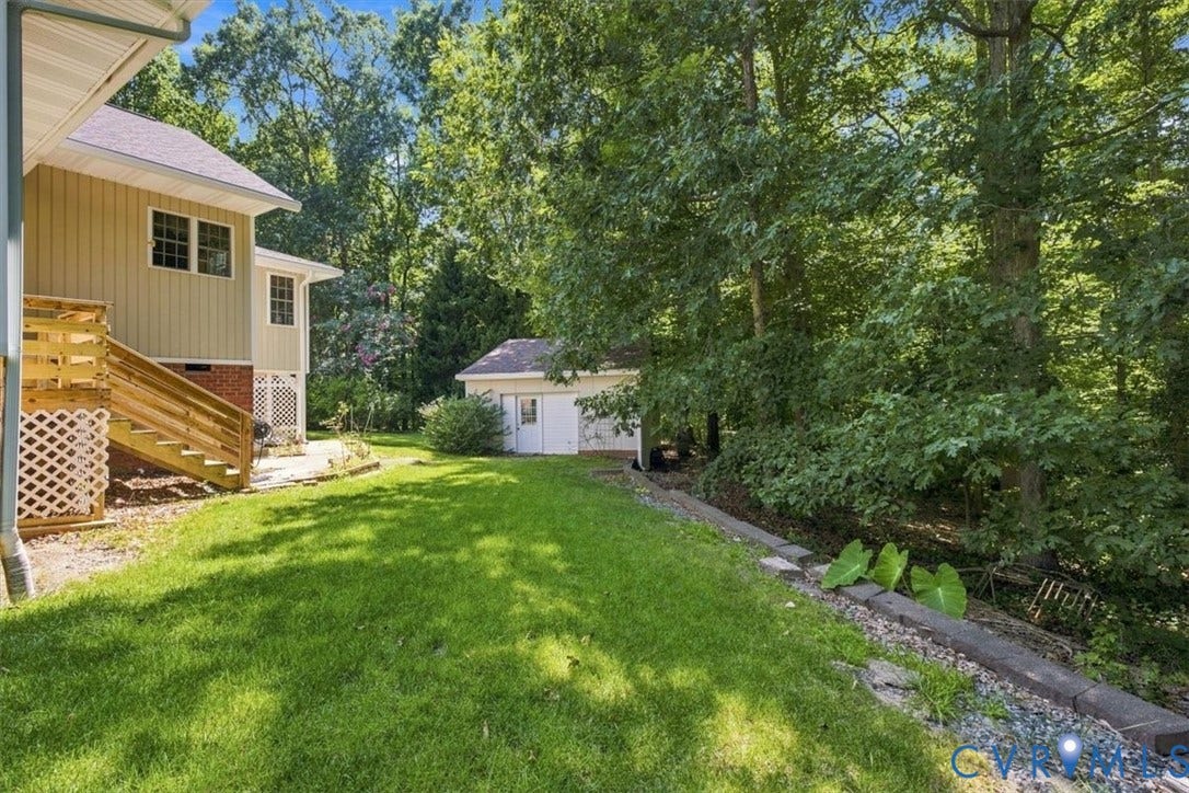12600 Lilking Road, Chester, VA 23831 Spacious rear yard with expansive lawn, elevated wood deck, and detached outbuilding