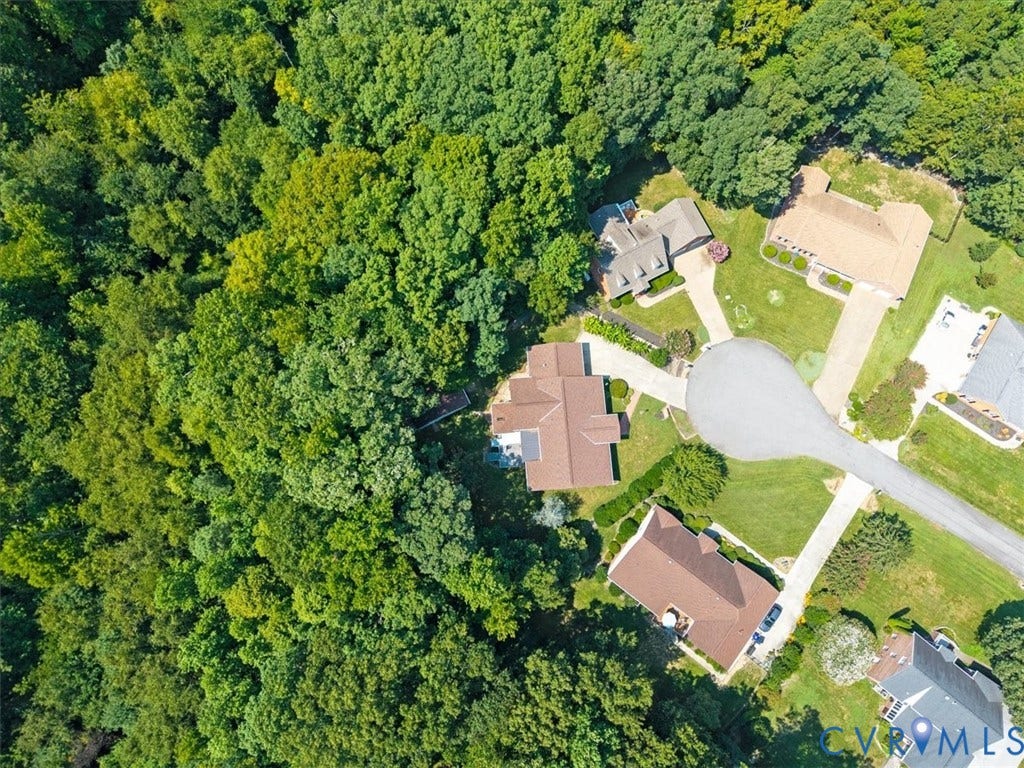 12600 Lilking Road, Chester, VA 23831 Aerial view showcasing multiple residences nestled within mature, densely forested surroundings