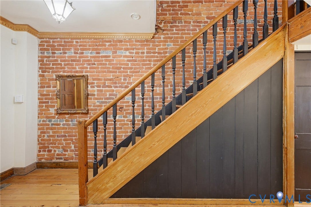 209 W Clay Street, Jackson Ward, Richmond, VA 23220 Exposed brick wall, natural wood staircase, wood flooring