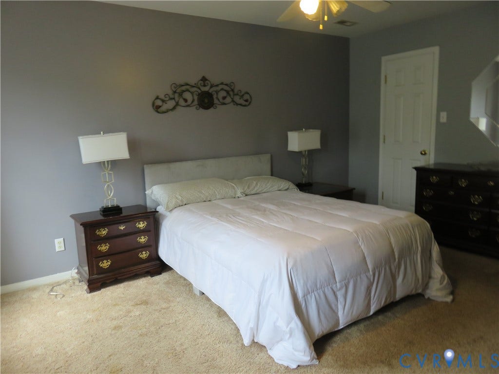 3107 McCabe Court, Chester, VA 23831 Neutral-toned walls complement the textured carpeting