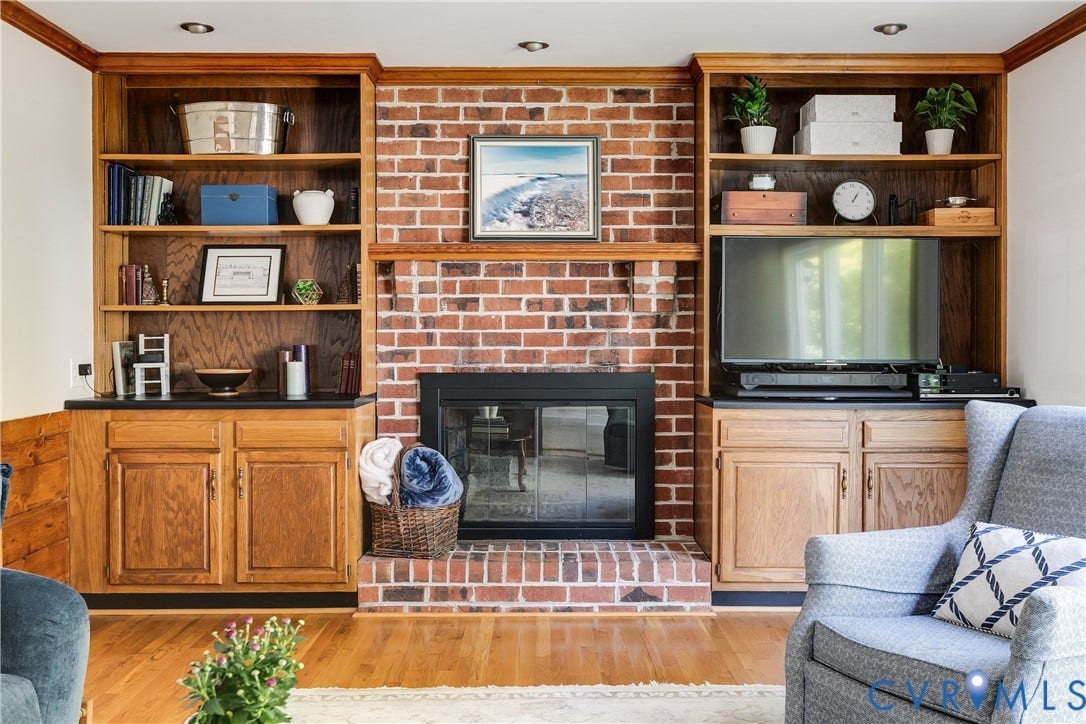 Brick Fire Place with Builtin Cabinets