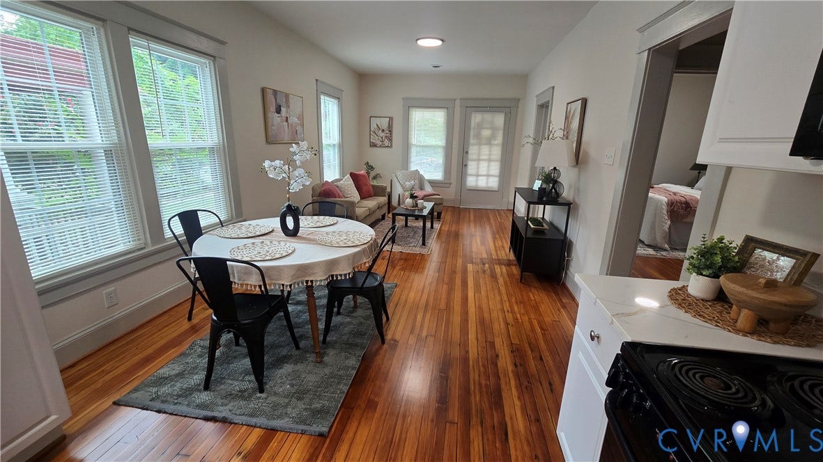 2317 5th Avenue, Richmond, VA 23222 Hardwood flooring extending throughout, white walls, and multiple windows