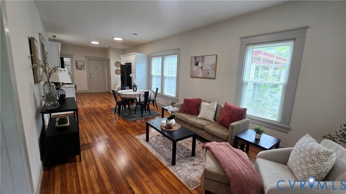 2317 5th Avenue, Richmond, VA 23222 Expansive living area with wood-finish flooring, multiple windows, and recessed lighting